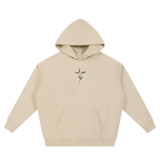 Beige hoodie with a small logo on a white background
