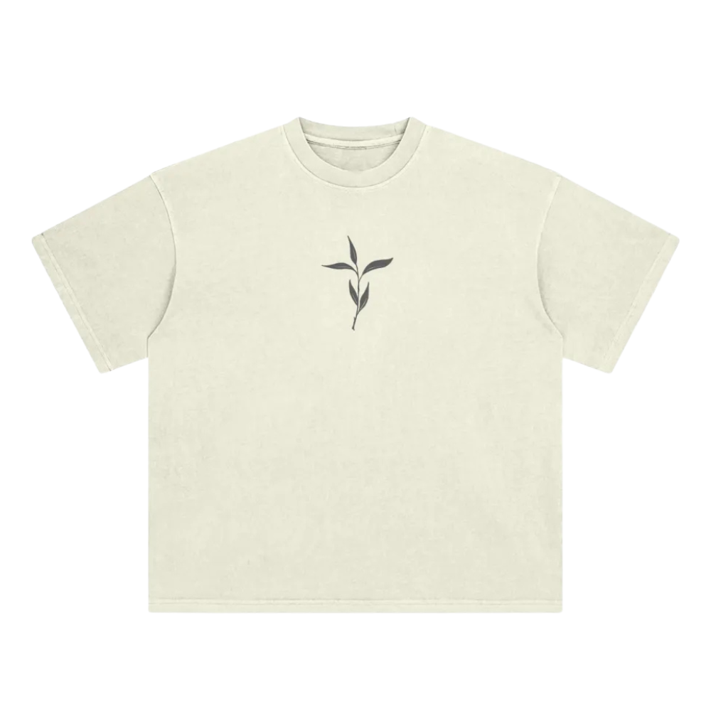 Beige t-shirt with a black leaf design on a white background